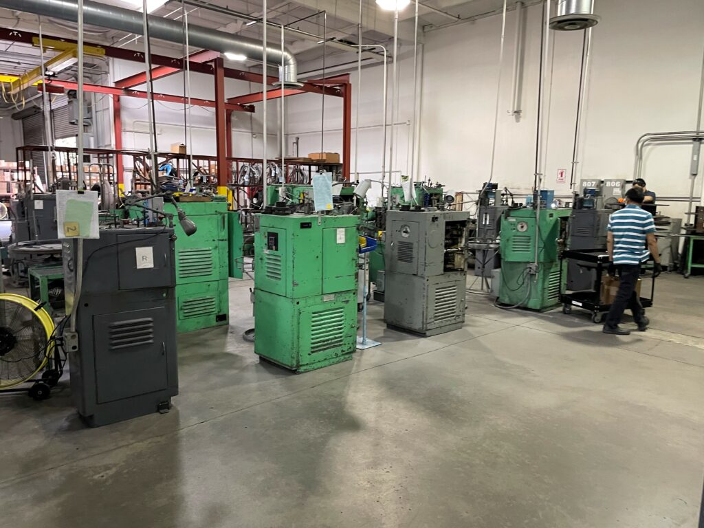 Large room with green machines